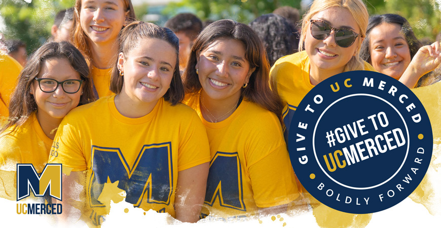 UC Merced students smile for a photo.